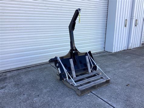 putting a winch on a skid steer|lifting jib for skid steer.